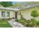 Landscaped pathway leading to the front door, highlighting the home's curb appeal and entrance at 18633 Oak Way Dr, Hudson, FL 34667