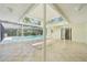 Inviting outdoor area featuring a screened pool with an open roof design at 18633 Oak Way Dr, Hudson, FL 34667