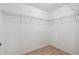Bright closet space featuring white wire shelving, ready for optimal storage solutions at 18710 Dobson Dr, Hudson, FL 34667