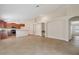 Open concept living with a kitchen featuring granite countertops and stainless steel appliances at 18710 Dobson Dr, Hudson, FL 34667