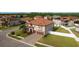 Aerial view of the property, showcasing its landscaping, surroundings, and community at 19082 Umberland Pl, Land O Lakes, FL 34638