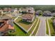 Aerial view of the home's large fenced backyard and well-maintained lawn on a sunny day at 19082 Umberland Pl, Land O Lakes, FL 34638