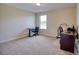 Spacious, carpeted room with two desks, offering ample workspace and natural light at 19082 Umberland Pl, Land O Lakes, FL 34638