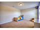 Spacious bedroom featuring light and a desk, complete with a cozy ambiance for restful nights and productive days at 19082 Umberland Pl, Land O Lakes, FL 34638