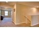 Hallway leading to a bedroom, showing carpeted floors and neutral wall paint at 19082 Umberland Pl, Land O Lakes, FL 34638