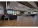 Spacious community center room with comfortable seating and an abundance of natural light at 19082 Umberland Pl, Land O Lakes, FL 34638