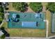 Aerial view of community playground featuring modern play equipment and shaded areas at 19082 Umberland Pl, Land O Lakes, FL 34638