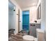 Well-lit bathroom featuring modern fixtures, vanity, and contemporary design elements at 20064 Manecke Rd, Brooksville, FL 34601