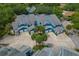 Aerial view of townhome community with landscaping and ample parking at 2026 Golfview Dr # 2026, Tarpon Springs, FL 34689