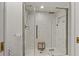 Modern bathroom featuring a tiled shower with glass doors and a sleek, contemporary design at 2026 Golfview Dr # 2026, Tarpon Springs, FL 34689
