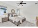 Comfortable bedroom with a ceiling fan and natural light at 3056 Abrams Trl, Odessa, FL 33556