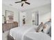 Comfortable bedroom with a view into the bathroom and kitchen at 3056 Abrams Trl, Odessa, FL 33556