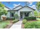 Charming single-story home with tidy landscaping, stone accents and a covered front porch at 3056 Abrams Trl, Odessa, FL 33556