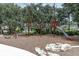 Discover a unique playground with climbing structures, slides, and rope bridges, perfect for adventurous  at 3056 Abrams Trl, Odessa, FL 33556