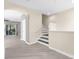 Bright foyer area with stairs leading to the second floor and views to the rear patio at 3119 Oyster Bayou Way, Clearwater, FL 33759