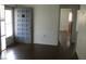 Welcoming entryway with dark hardwood floors and neutral wall color at 3214 Pinon Dr, Holiday, FL 34691
