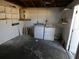 Inside the garage, view of washer and dryer hookups at 3214 Pinon Dr, Holiday, FL 34691