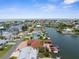 Aerial view highlighting the waterfront home's access to the open water and community's extensive canal system at 3361 Gulfview Dr, Hernando Beach, FL 34607