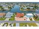 Stunning aerial view of the waterfront home with dock and canal access in a desirable neighborhood at 3361 Gulfview Dr, Hernando Beach, FL 34607