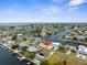 Aerial image captures the extensive canal system, waterfront homes, and scenic coastal community at 3361 Gulfview Dr, Hernando Beach, FL 34607