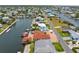 A birds-eye view capturing the beautiful waterfront home, adjacent canal, and surrounding neighborhood at 3361 Gulfview Dr, Hernando Beach, FL 34607