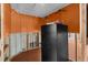 Walk in closet area with shelving that needs remodel with orange walls and new tile floors at 3361 Gulfview Dr, Hernando Beach, FL 34607