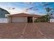 Inviting single-story home featuring a brick driveway, two-car garage, and well-maintained landscaping at 3361 Gulfview Dr, Hernando Beach, FL 34607