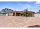 Inviting front yard with a basketball hoop and circular driveway at 3361 Gulfview Dr, Hernando Beach, FL 34607