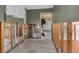 Kitchen area needing remodel with tile floors and sage green paint ready for new owner's design choices at 3361 Gulfview Dr, Hernando Beach, FL 34607