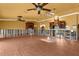Spacious living room featuring wood cabinets and modern lighting at 3361 Gulfview Dr, Hernando Beach, FL 34607