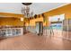 Bright living room with decorative chandelier and view of water at 3361 Gulfview Dr, Hernando Beach, FL 34607
