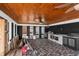Spacious room with an outdoor kitchen, complete with a grill and ample counter space for entertaining guests at 3361 Gulfview Dr, Hernando Beach, FL 34607