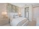 Comfortable bedroom features a closet with white doors and ample storage space for a neat and organized feel at 3511 Malta Ave, Wesley Chapel, FL 33543