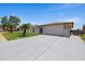 Attractive single-Gathering home with a spacious driveway and a well-kept front lawn at 3534 Cockatoo Dr, New Port Richey, FL 34652