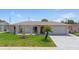 Charming single story home features a well-manicured lawn and a spacious two-car garage at 3534 Cockatoo Dr, New Port Richey, FL 34652