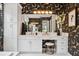 Large bathroom featuring vanity area with make up table, and decorative wall paper at 3915 Corsica Pl, Wesley Chapel, FL 33543