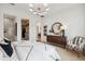 Beautiful main bedroom with ensuite bath, stylish furnishings, and tasteful decor create a relaxing retreat at 3915 Corsica Pl, Wesley Chapel, FL 33543