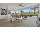 Wide-open patio includes outdoor seating, lush backyard, and outdoor bar at 3915 Corsica Pl, Wesley Chapel, FL 33543