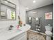Stylish bathroom with a white countertop, modern faucet, and neutral grey paint at 4128 Camelia Dr, Hernando Beach, FL 34607