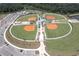 Aerial view showcases sports complex with well-maintained baseball fields, tennis courts and ample parking at 4188 Barbour Trl, Odessa, FL 33556