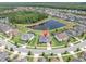 Aerial view of the home showcasing its location on a cul-de-sac with a pond view at 4188 Barbour Trl, Odessa, FL 33556
