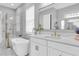 The bathroom features a standalone tub, walk-in shower, and white marble countertops at 4188 Barbour Trl, Odessa, FL 33556