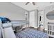 Cozy bedroom featuring a playful bunk bed with a slide and a stylish blue rug at 4188 Barbour Trl, Odessa, FL 33556