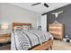 Stylish bedroom features natural light, unique decor, and a ceiling fan at 4188 Barbour Trl, Odessa, FL 33556