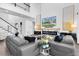Spacious living room showcasing a fireplace, high ceilings, and modern decor at 4188 Barbour Trl, Odessa, FL 33556