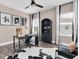 Comfortable home office featuring a spacious desk, ergonomic chair, and ample storage at 4188 Barbour Trl, Odessa, FL 33556