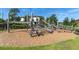 The community's unique playground features wooden structures for climbing and adventurous play at 4188 Barbour Trl, Odessa, FL 33556