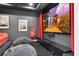 Home theater with a large screen, comfortable seating, and a fun popcorn machine at 4188 Barbour Trl, Odessa, FL 33556