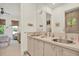 Bright bathroom with double sinks, plenty of counter space, and stylish fixtures at 4541 School Rd, Land O Lakes, FL 34638