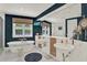 Bright bathroom featuring a soaking tub, double sinks, and an expansive mirror at 4541 School Rd, Land O Lakes, FL 34638